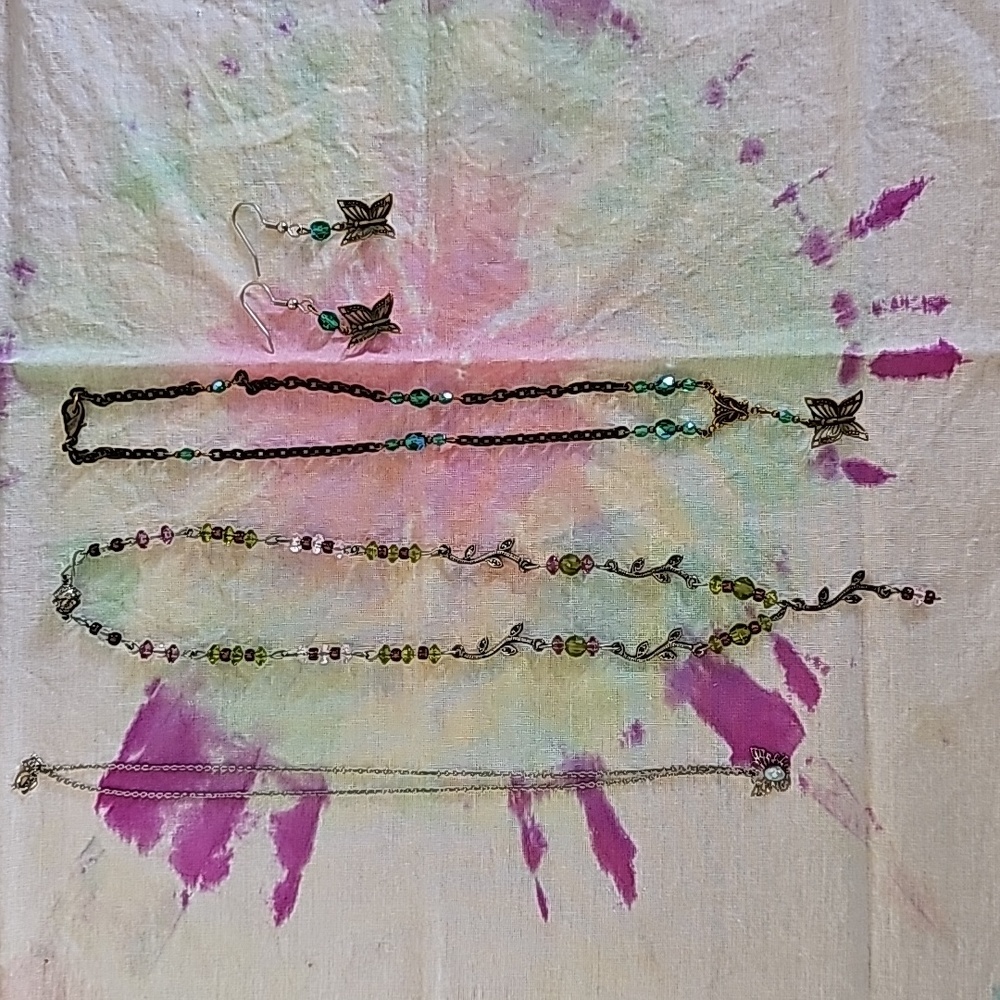 Set of three necklaces and one set of earrings